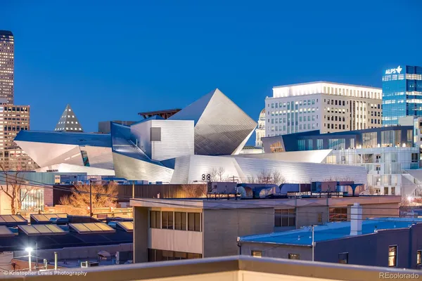 a kitchen with stainless steel appliances granite countertop a stove and cabinets