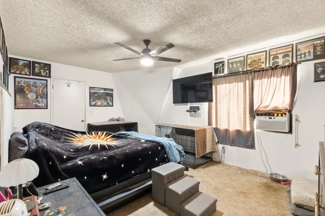 a bathroom with a sink double vanity granite tub shower and a mirror