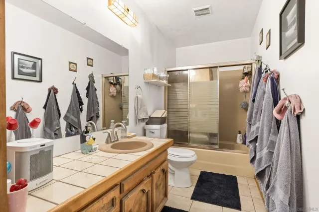 a view of workspace with wooden floor windows