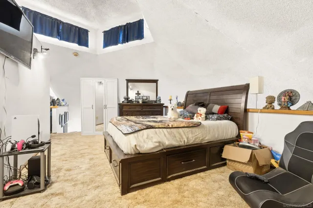 a workspace with furniture and a wooden floor