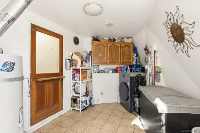 a view of a roof deck with wooden floor and fence