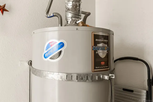 a view of a balcony with wooden fence and floor