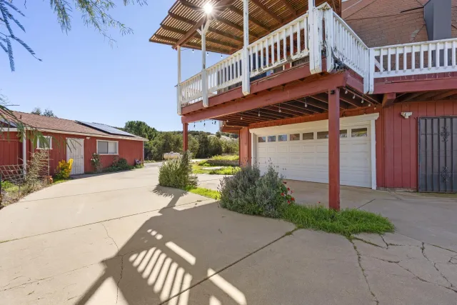 a view of a town with mountains in the background