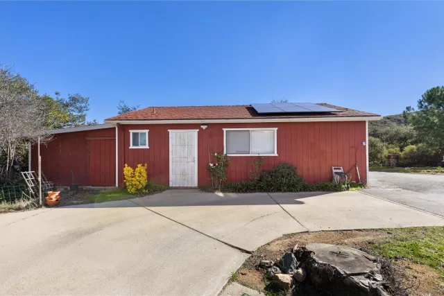 a view of a town with palm trees