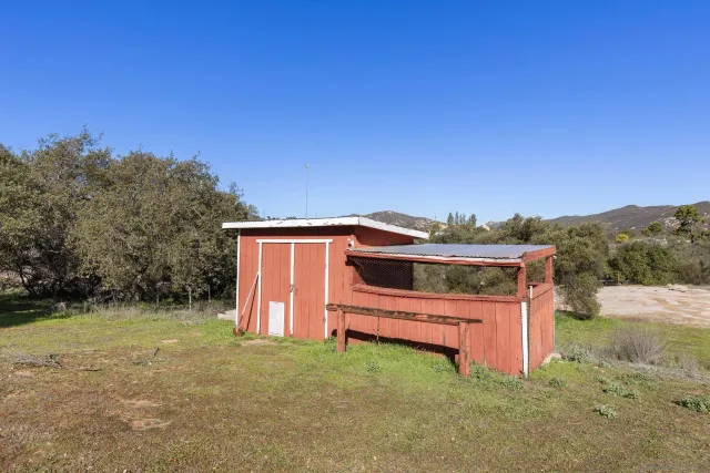 an aerial view of town and residential houses with outdoor space