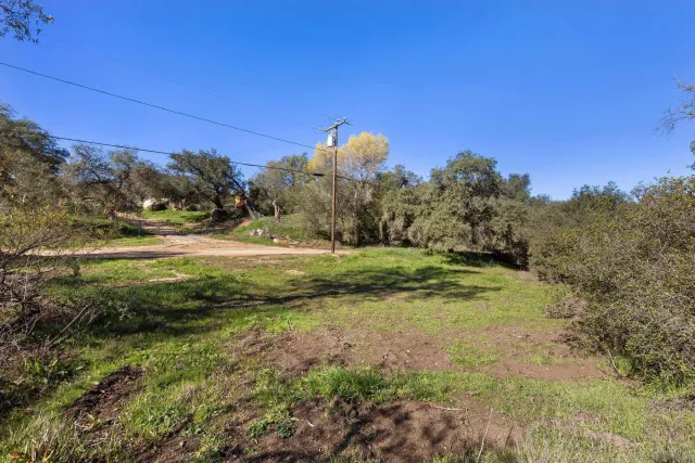 a view of a mountain with sitting area