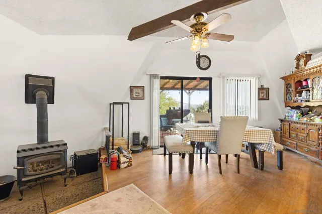 a view of a livingroom with furniture and window