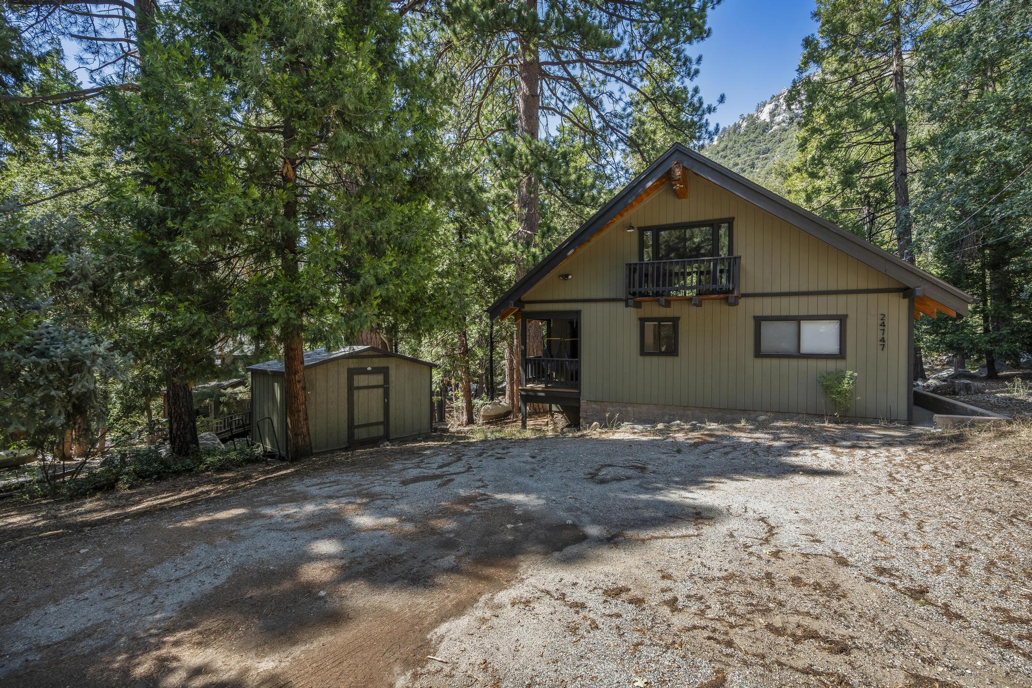 24747 Fern Valley Road Idyllwild, CA 92549 - Photo 41 of 42 a view of a house with a yard