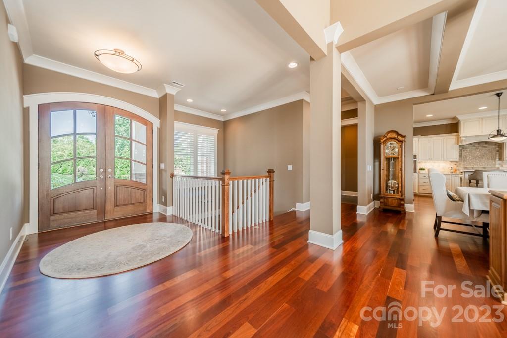 218 Queens Cove Road Mooresville, NC 28117 - Photo 11 of 42 a view of livingroom with furniture wooden floor and windows