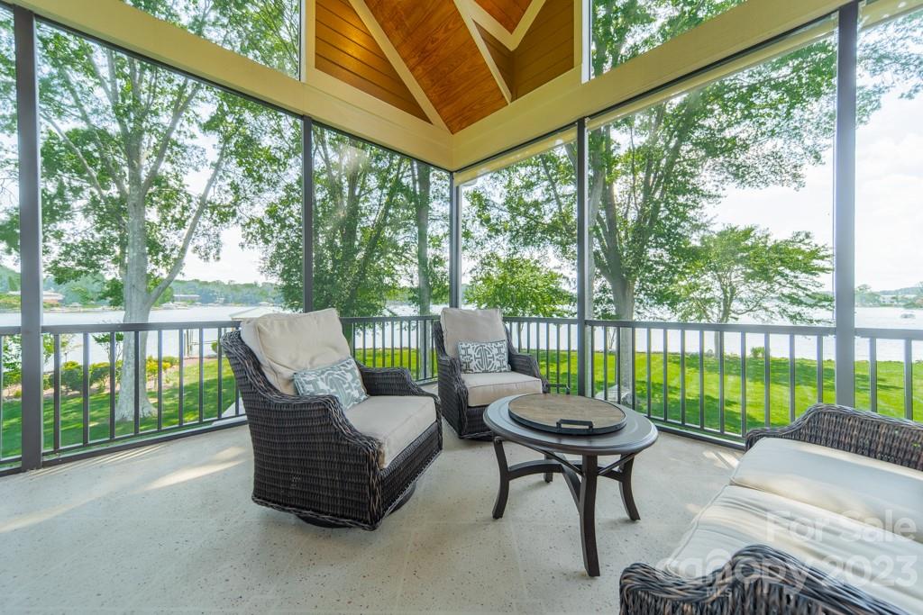 218 Queens Cove Road Mooresville, NC 28117 - Photo 18 of 42 a view of a chairs and table in the patio