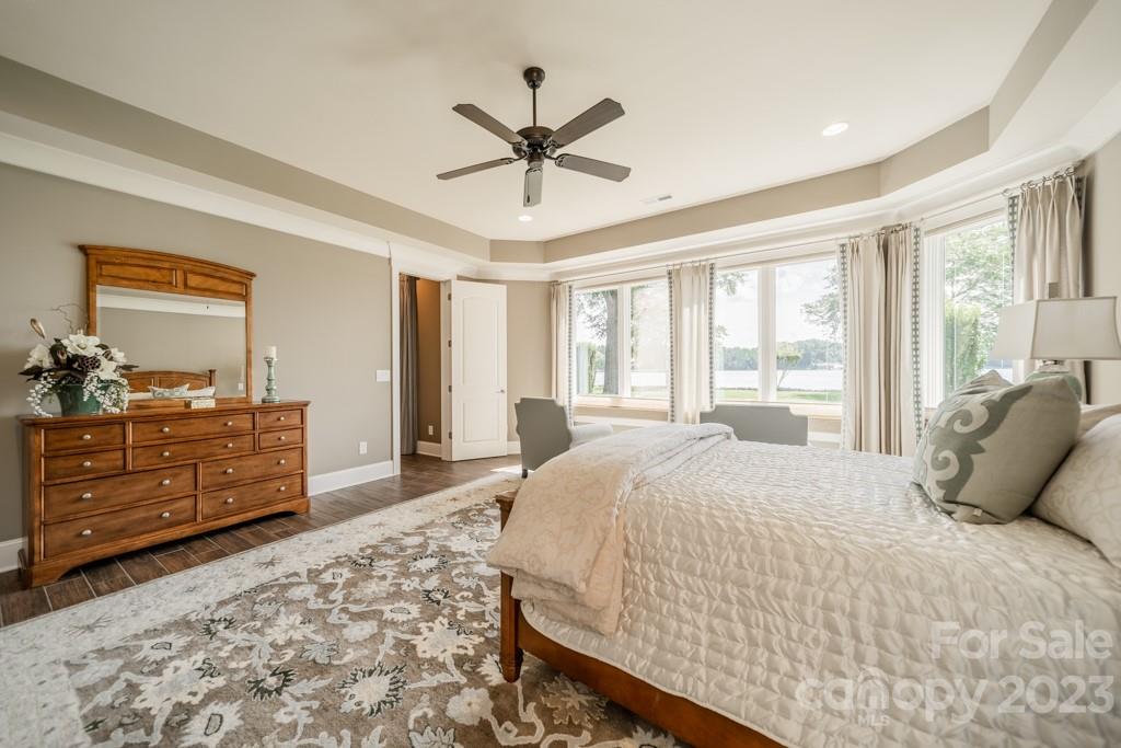 218 Queens Cove Road Mooresville, NC 28117 - Photo 33 of 42 a bedroom with a bed and a dresser