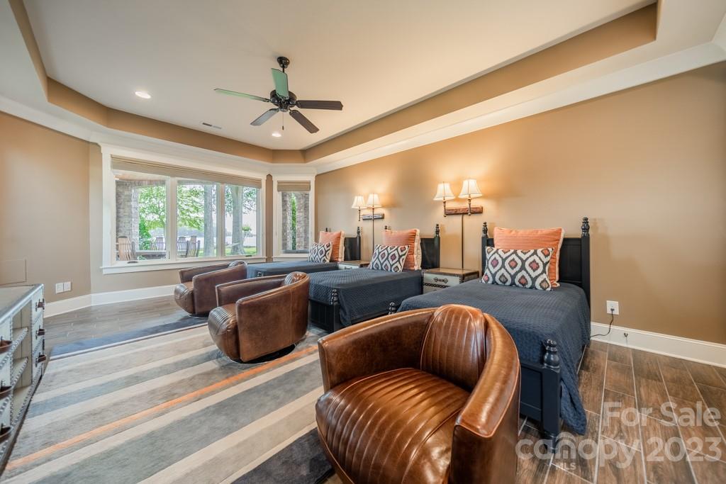 218 Queens Cove Road Mooresville, NC 28117 - Photo 36 of 42 a living room with furniture and a large window