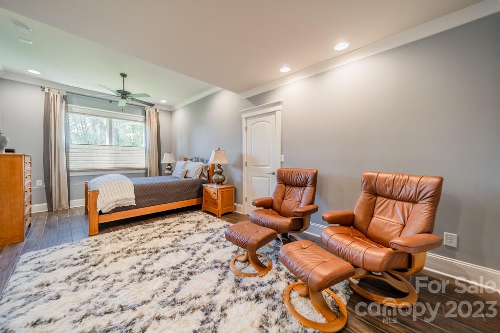 218 Queens Cove Road Mooresville, NC 28117 - Photo 39 of 42 a bedroom with furniture and wooden floor