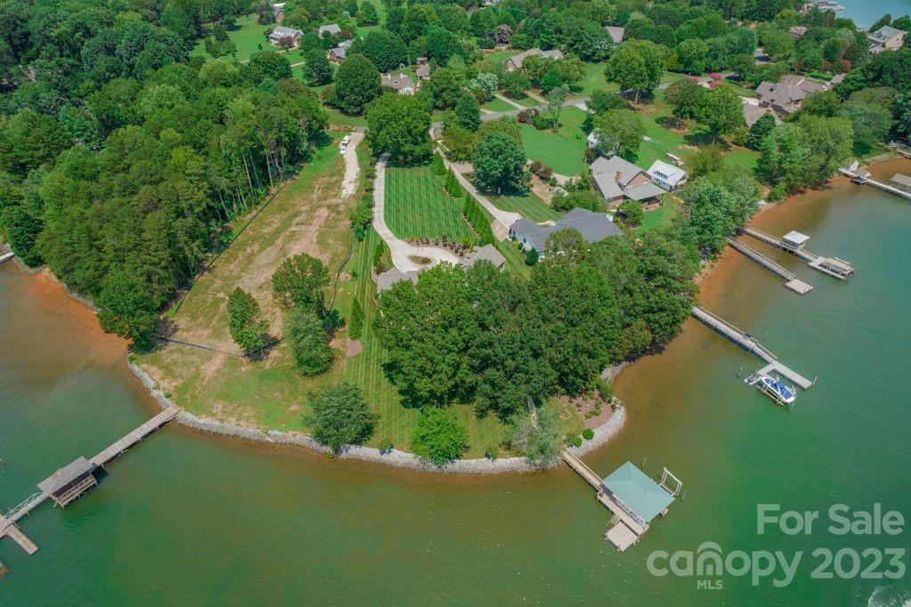 218 Queens Cove Road Mooresville, NC 28117 - Photo 6 of 42 an aerial view of a residential houses with outdoor space and trees all around