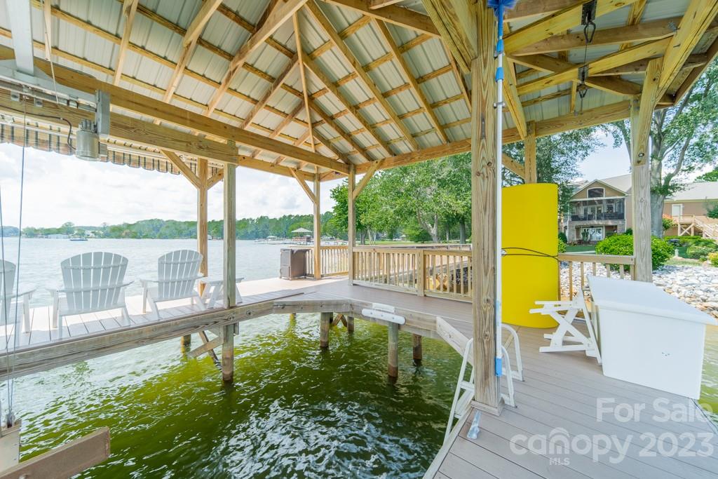 218 Queens Cove Road Mooresville, NC 28117 - Photo 10 of 42 a view of a swimming pool with a patio and a yard