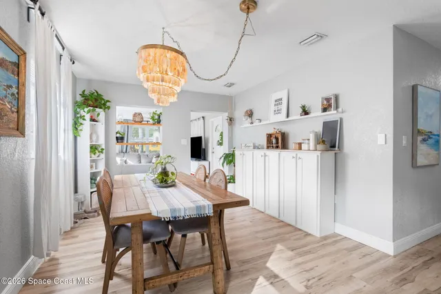 a view of a dining room with furniture