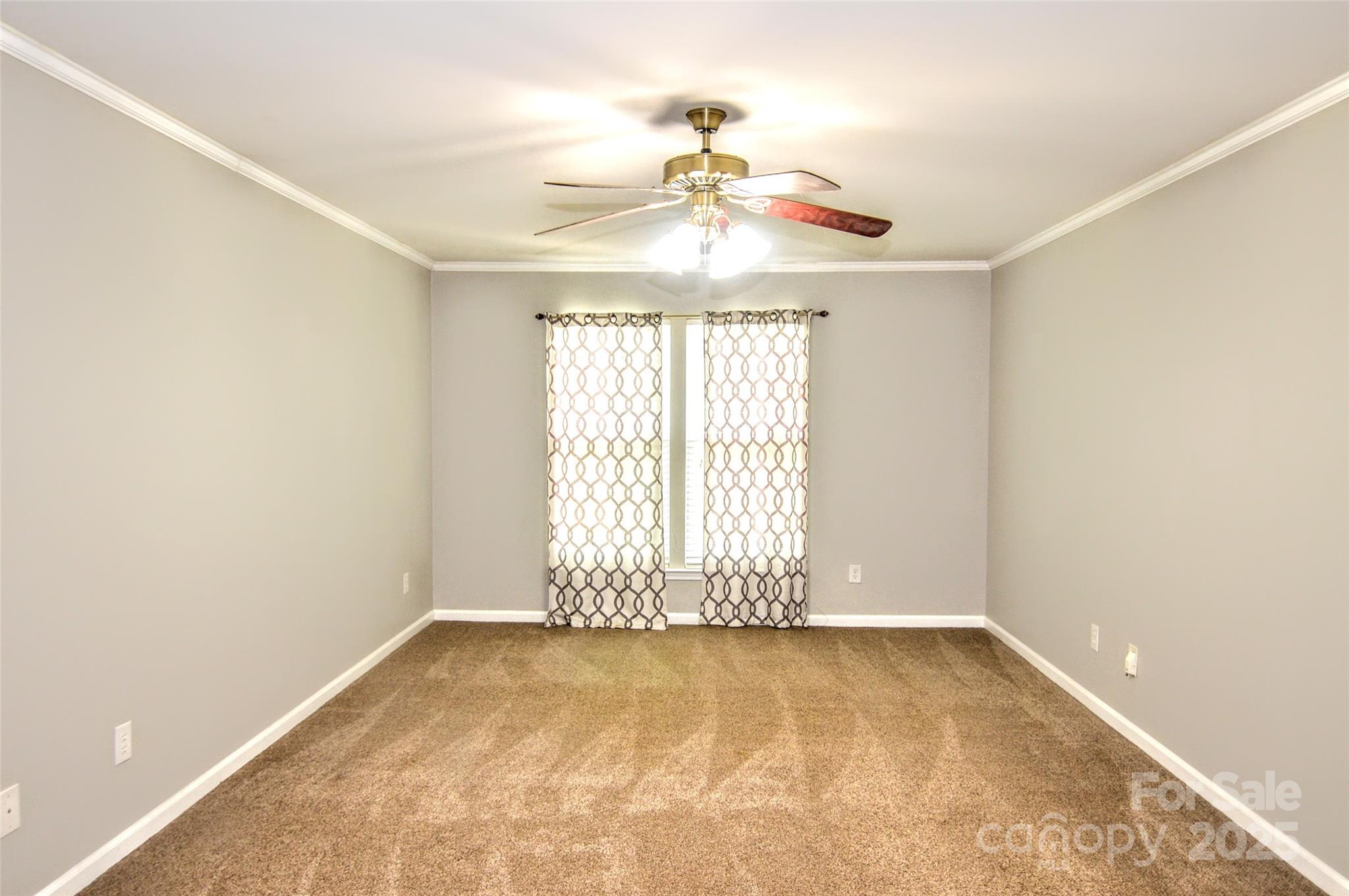 2035 Hollyhedge Lane Indian Trail, NC 28079 - Photo 18 of 32 an empty room with a window