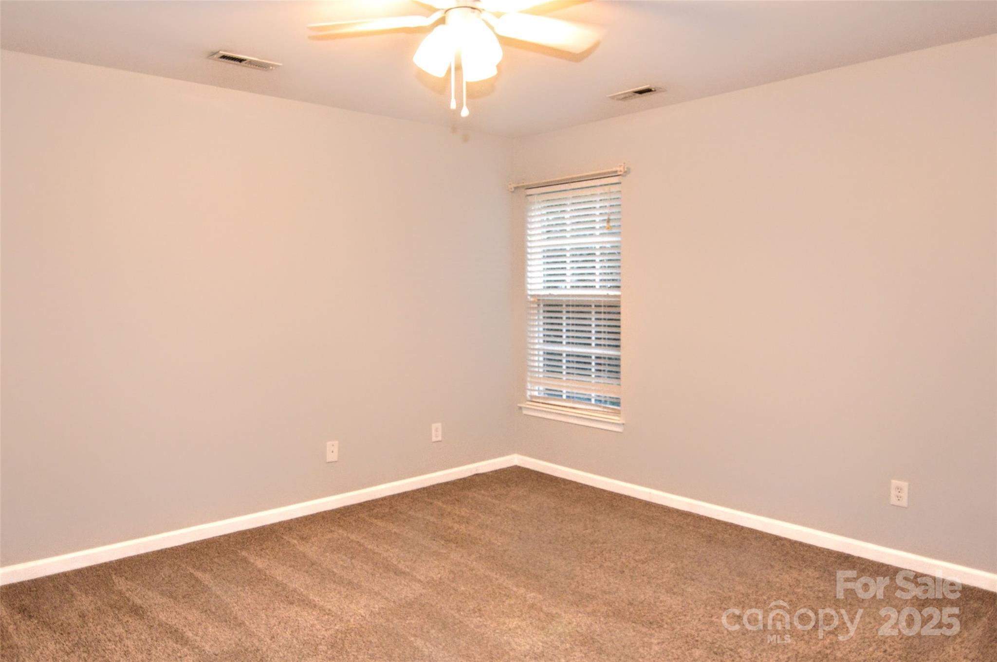 2035 Hollyhedge Lane Indian Trail, NC 28079 - Photo 22 of 32 an empty room with a window