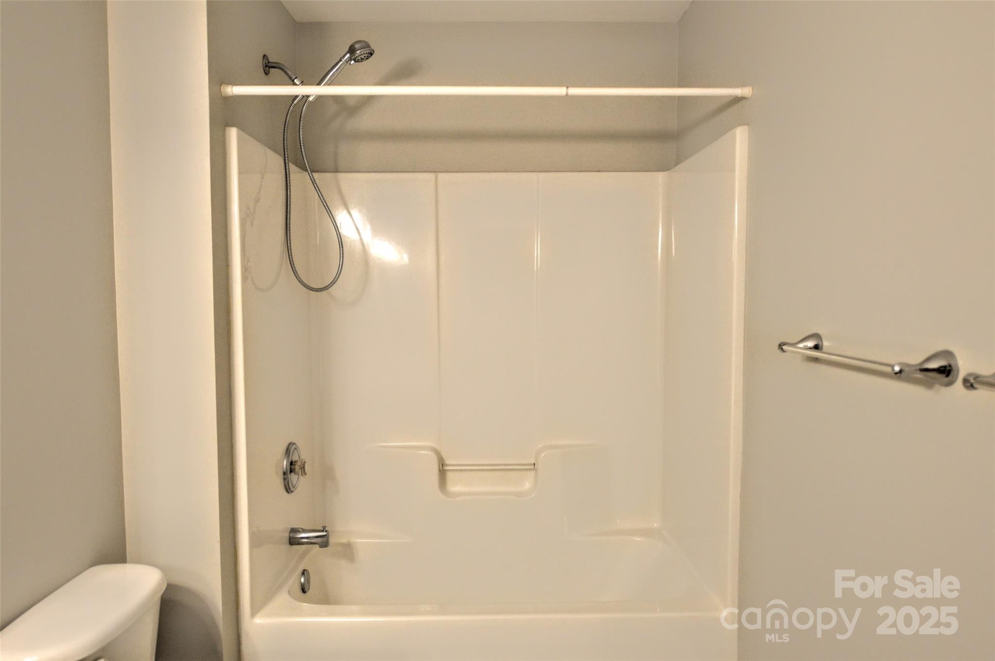 2035 Hollyhedge Lane Indian Trail, NC 28079 - Photo 25 of 32 a bathroom with a shower and a sink