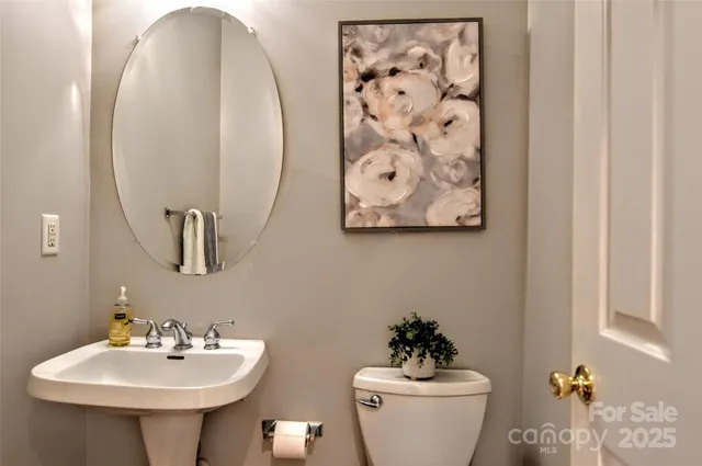a bathroom with a sink and mirror
