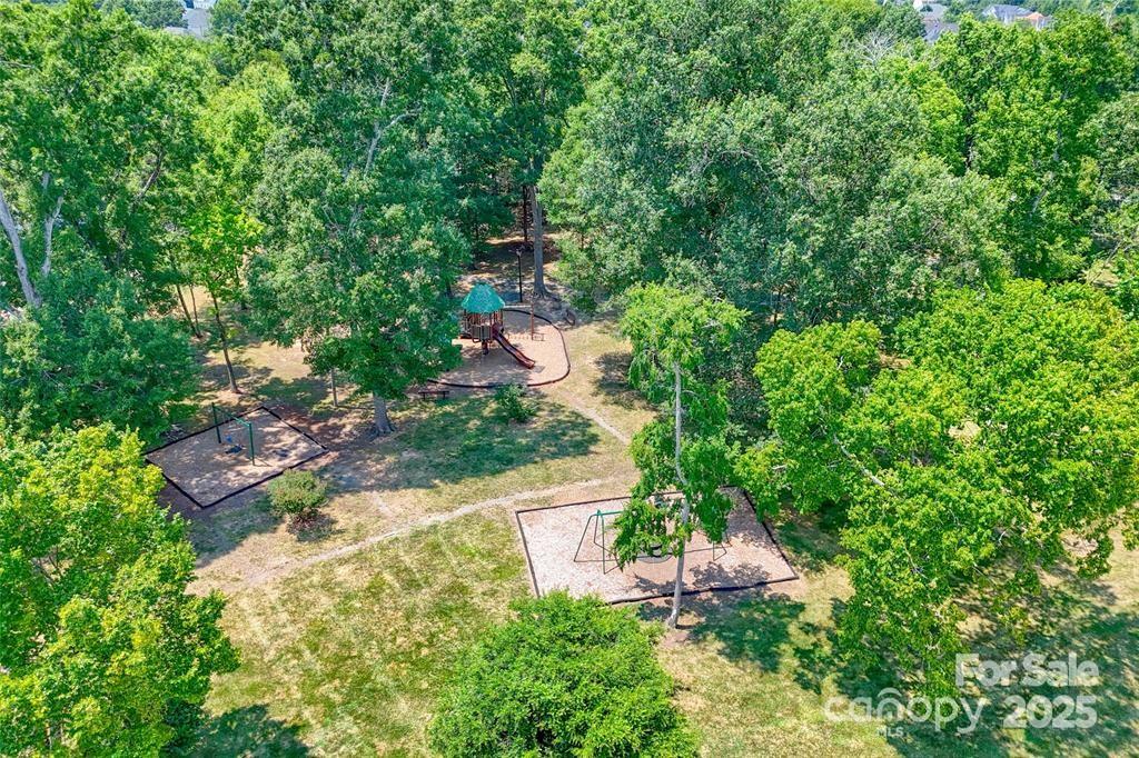 2035 Hollyhedge Lane Indian Trail, NC 28079 - Photo 30 of 32 a view of a house with a yard and plants