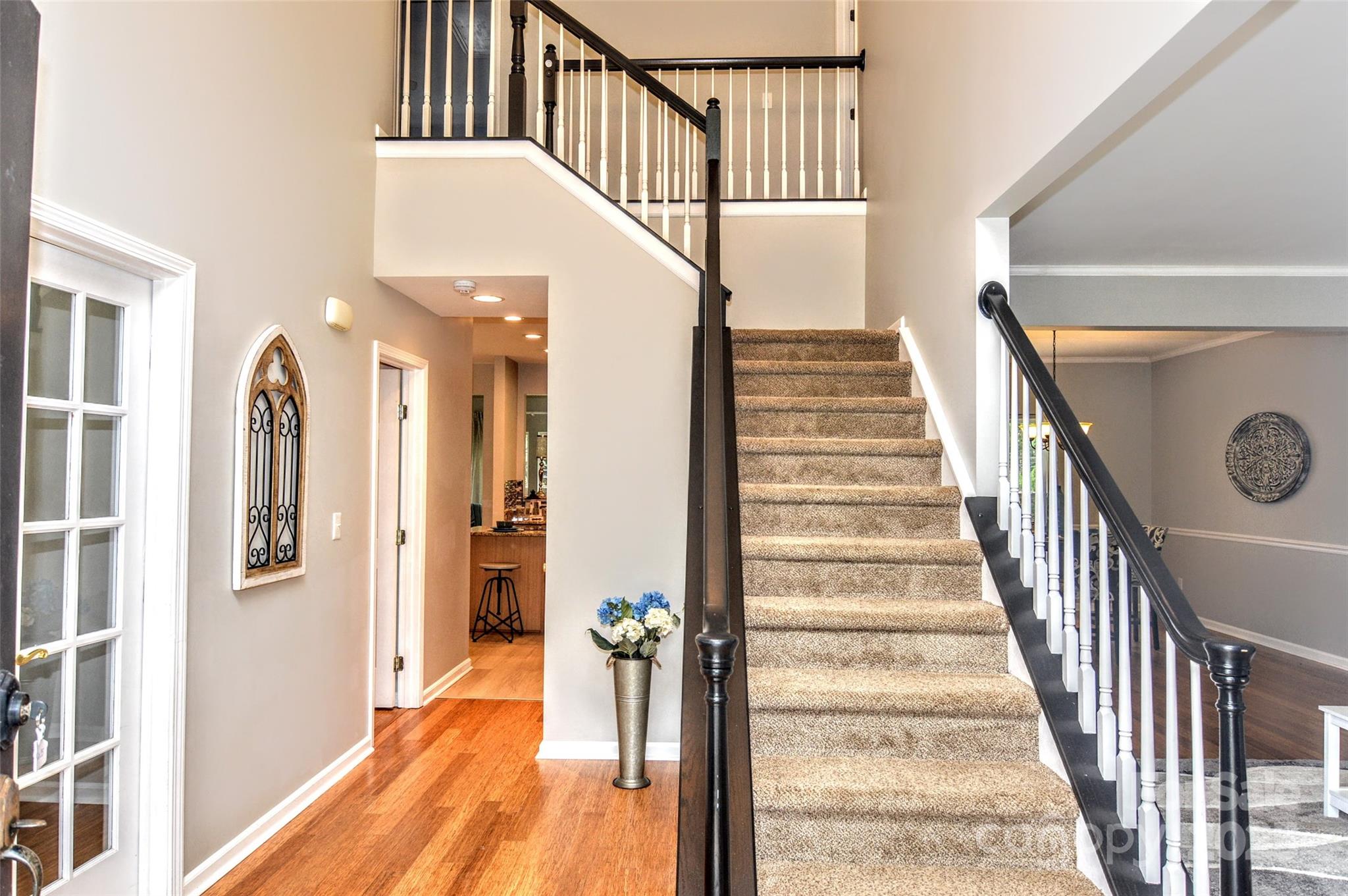 2035 Hollyhedge Lane Indian Trail, NC 28079 - Photo 3 of 32 a view of entryway and hall with wooden floor