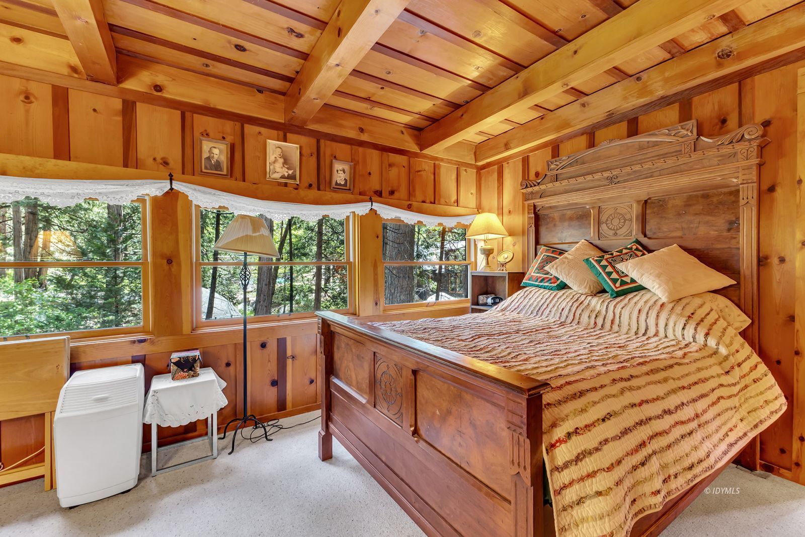 25100 Indian Rock Road Idyllwild, CA 92549 - Photo 49 of 75 a bedroom with furniture and large windows