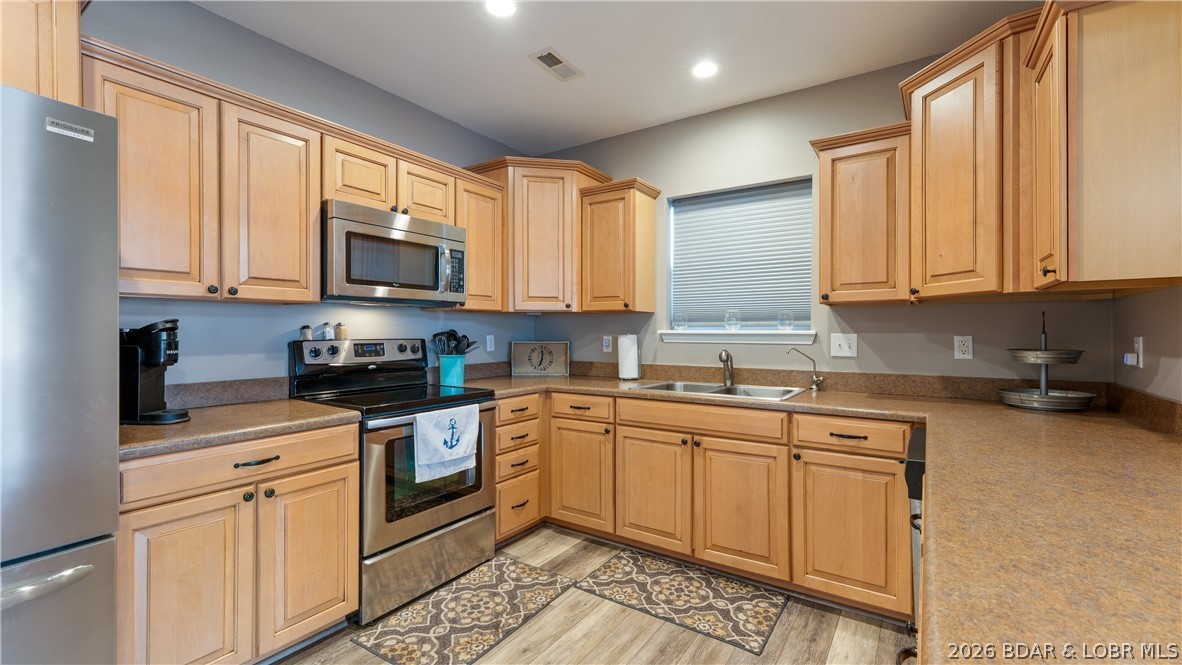 168 Satisfaction Point Sunrise Beach, MO 65079 - Photo 3 of 58