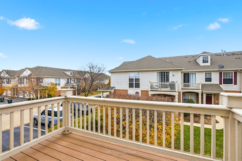 9017 Concord Lane, Unit L Justice, IL 60458 - Photo 20 of 20 a view of a city from a balcony
