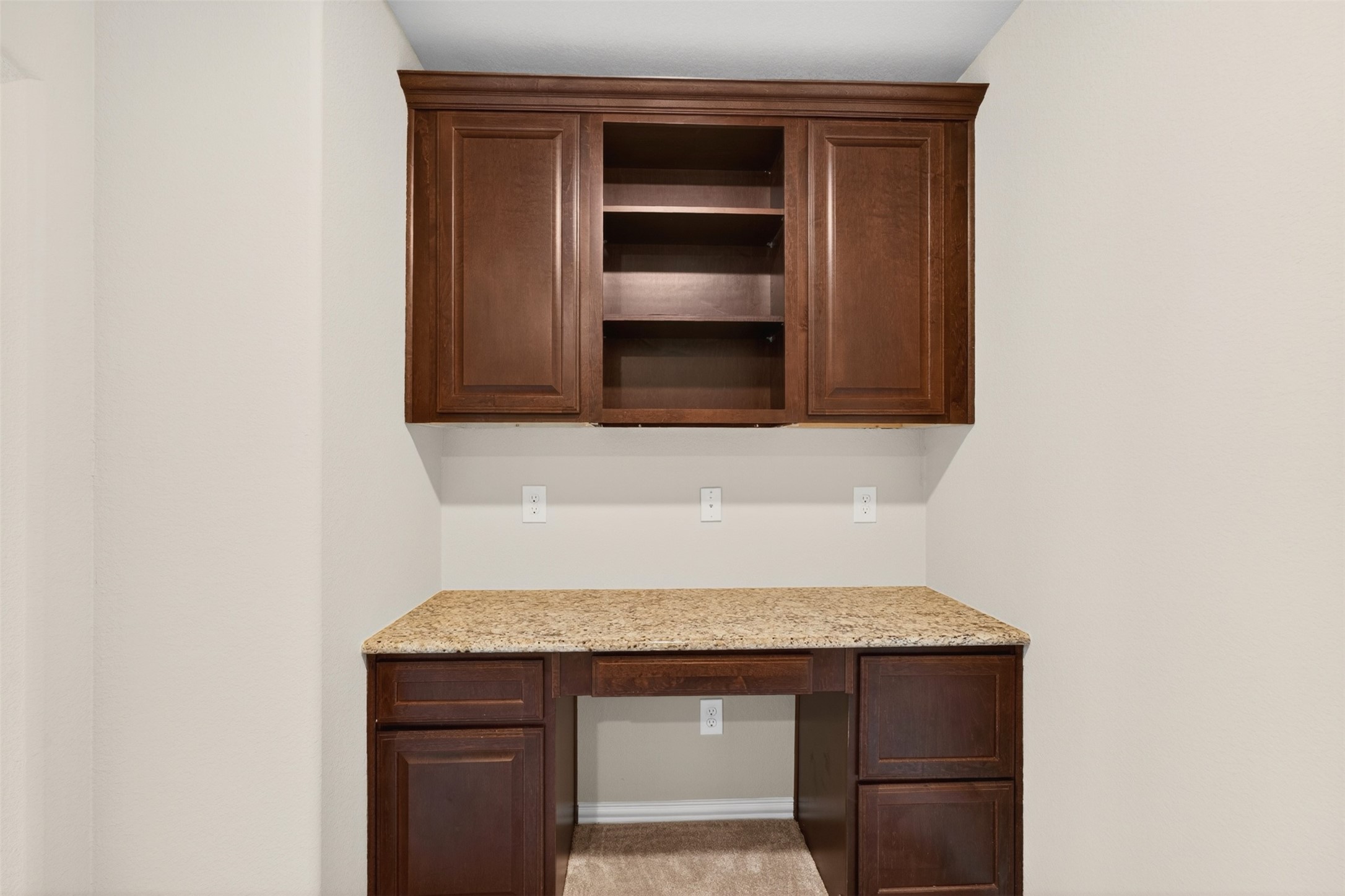 18202 Wedgewood Bluff Court Spring, TX 77379 - Photo 33 of 50 Built-in desk nook with upper cabinetry and granite work surface.