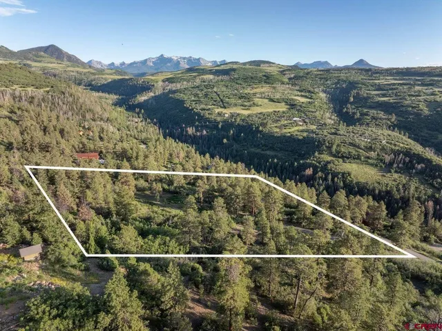 a view of a balcony with an outdoor space