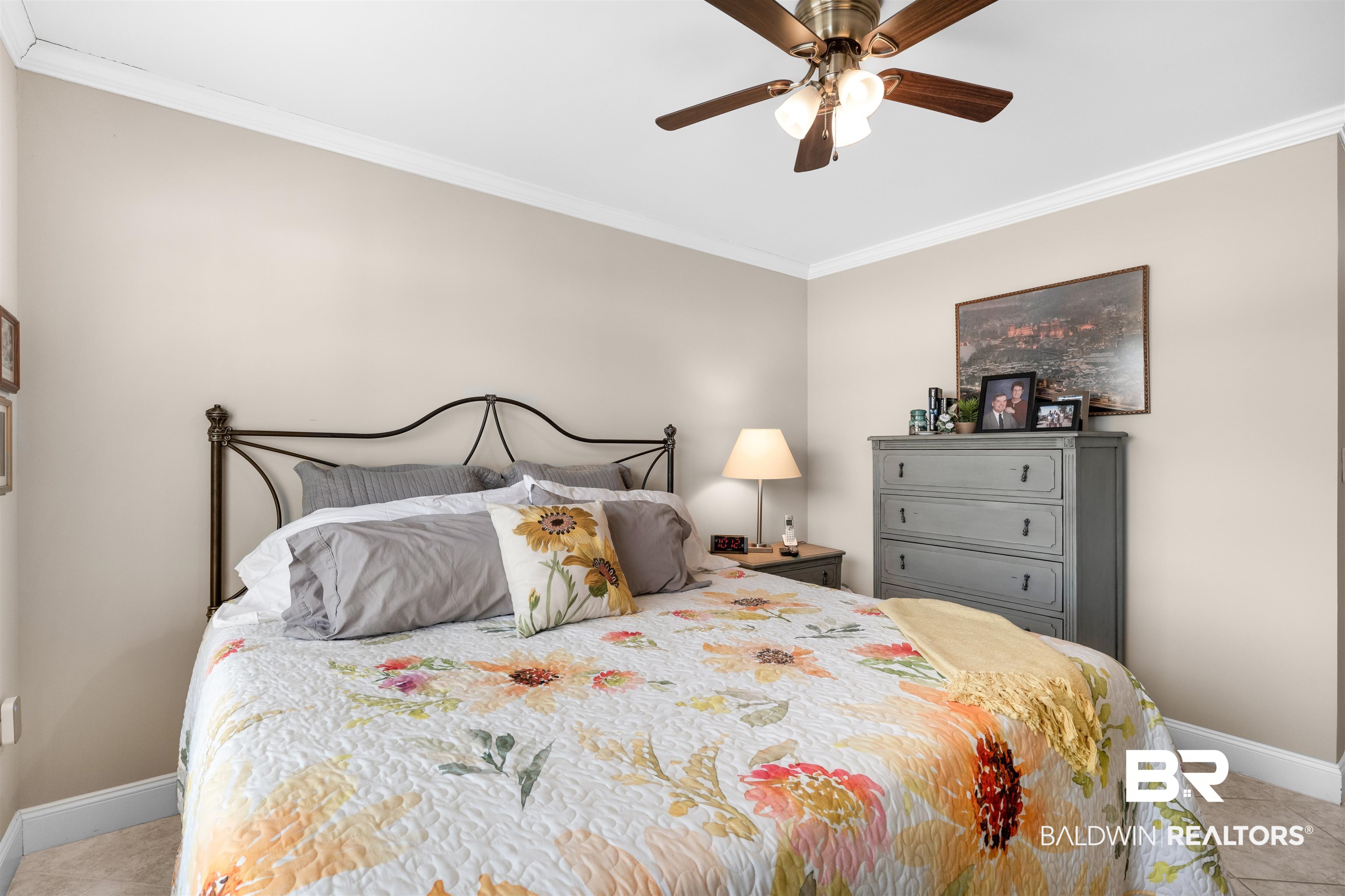 1517 Regency Road, Unit 68 Gulf Shores, AL 36542 - Photo 18 of 43 Tiled bedroom featuring ceiling fan and ornamental molding