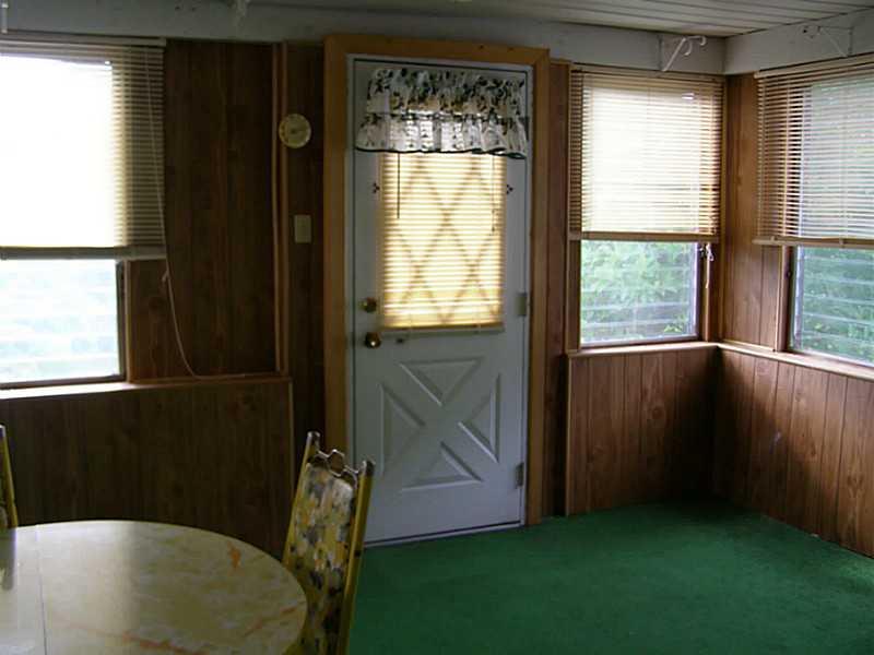 144 Murrysville Road Level Green, PA 15085 - Photo 14 of 25 Sunroom. Enter the Backyard from the Sunroom