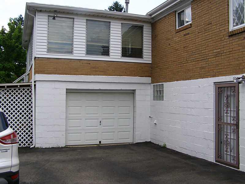 144 Murrysville Road Level Green, PA 15085 - Photo 3 of 25 Exterior Front. New Garage Door