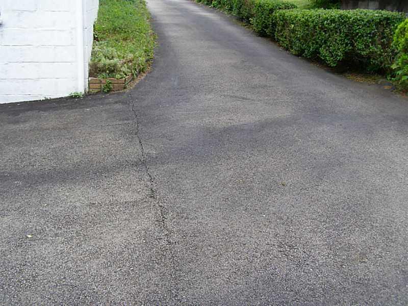 144 Murrysville Road Level Green, PA 15085 - Photo 23 of 25 Parking Lot/Garage. Asphalt Driveway to rear Integral Garage