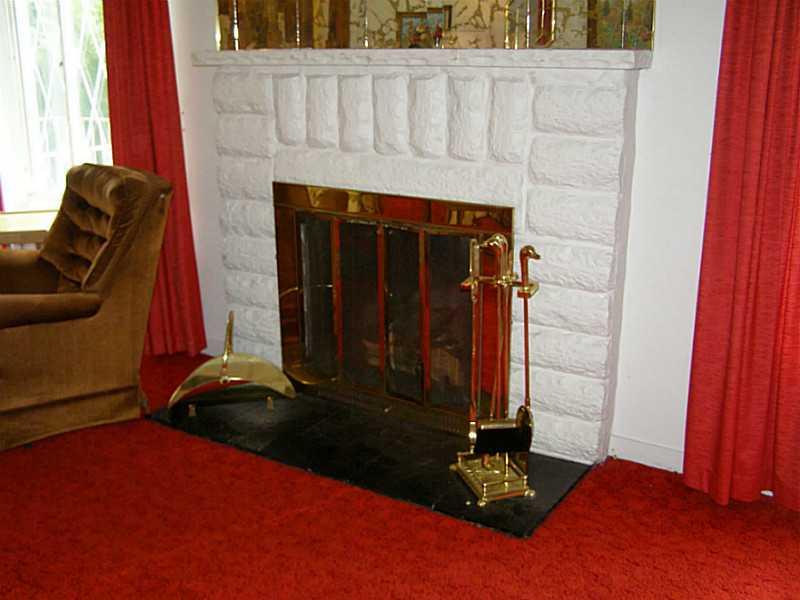 144 Murrysville Road Level Green, PA 15085 - Photo 7 of 25 Living Room. Brick Fireplace
