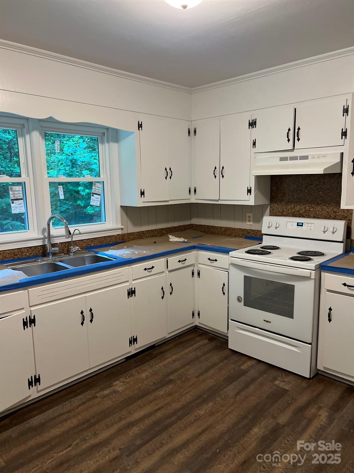 755 Victory Grove Church Road Lincolnton, NC 28092 - Photo 6 of 9 a kitchen with granite countertop white cabinets and white appliances