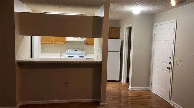 a bathroom with a sink a mirror and a shower