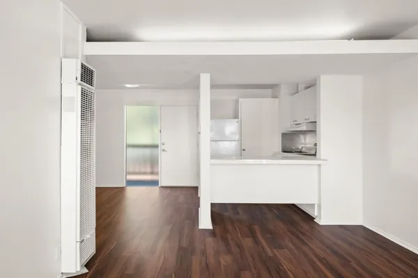 a view of kitchen with wooden floor