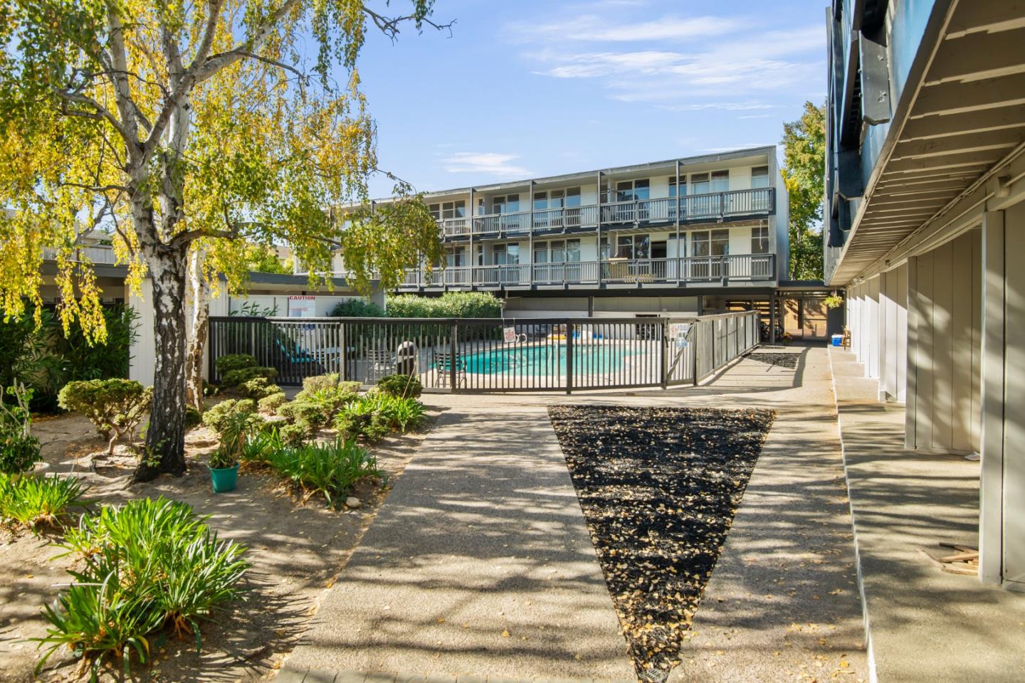 1775 Marco Polo Way Burlingame, CA 94010 - Photo 5 of 23 a view of a building with a yard