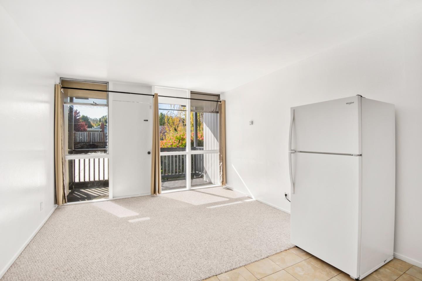 1775 Marco Polo Way Burlingame, CA 94010 - Photo 6 of 23 a view of a room with wooden floor and windows