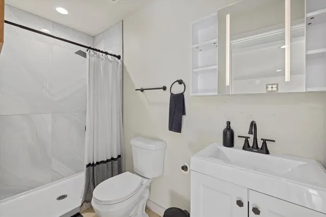 a view of a room with furniture and toys