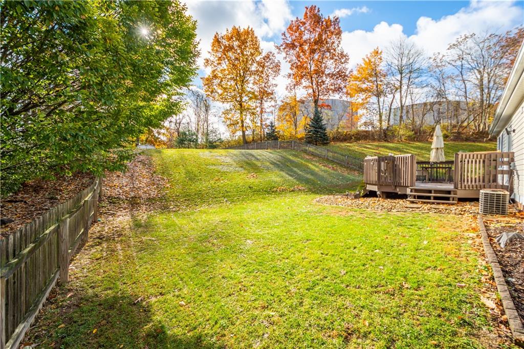307 Lawrence Place Coraopolis, PA 15108 - Photo 2 of 25 a view of yard with swimming pool and trees