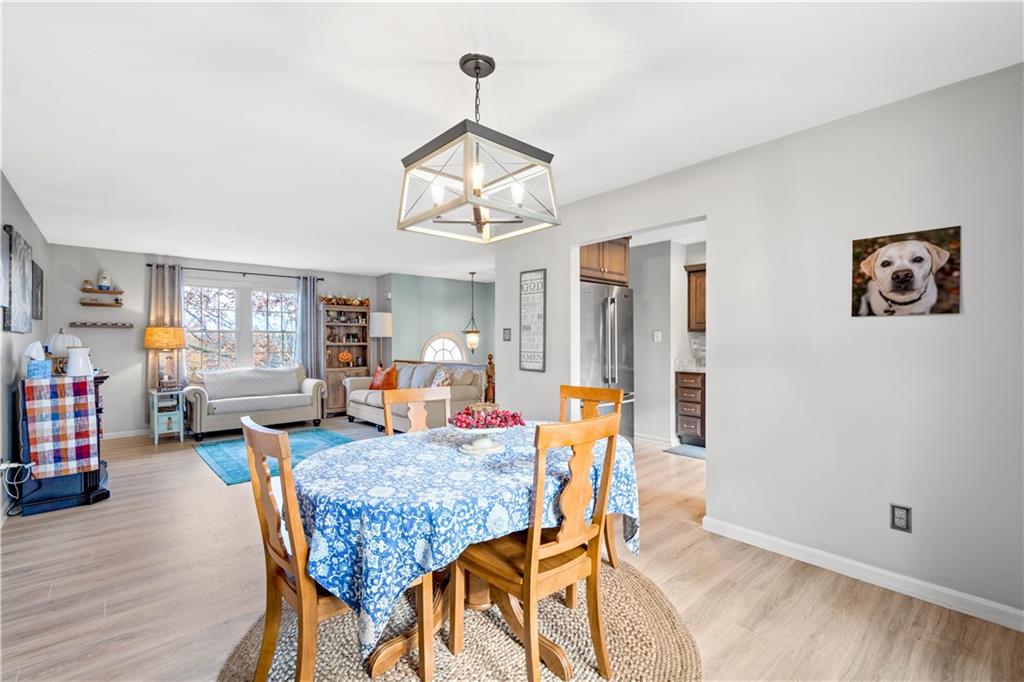307 Lawrence Place Coraopolis, PA 15108 - Photo 11 of 25 a dining room with furniture and wooden floor