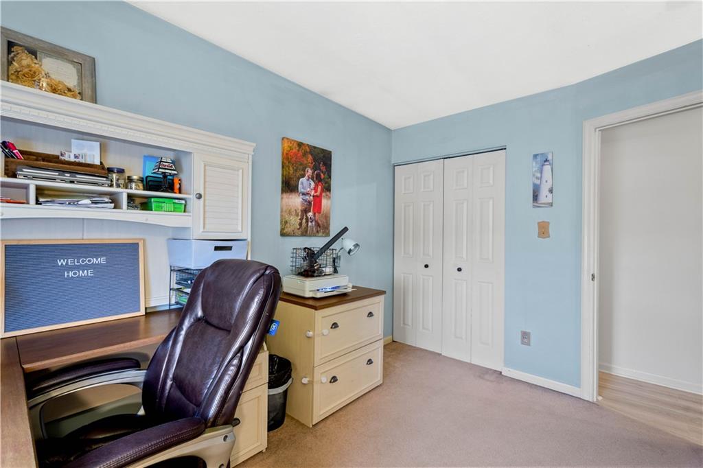 307 Lawrence Place Coraopolis, PA 15108 - Photo 20 of 25 a room with furniture and a workspace