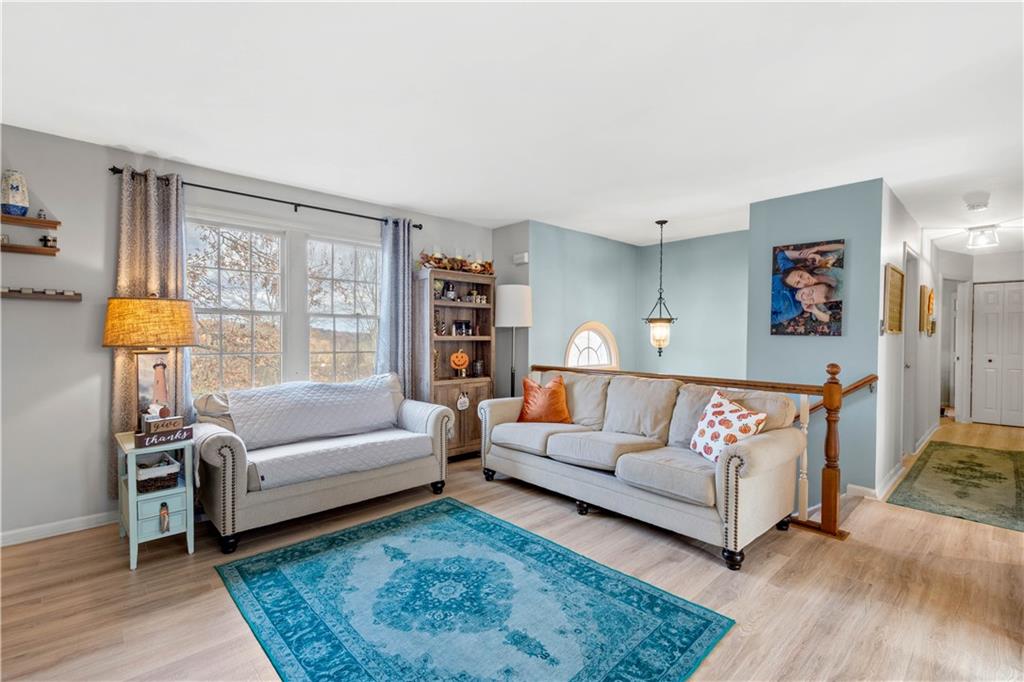 307 Lawrence Place Coraopolis, PA 15108 - Photo 7 of 25 a living room with furniture and a large window