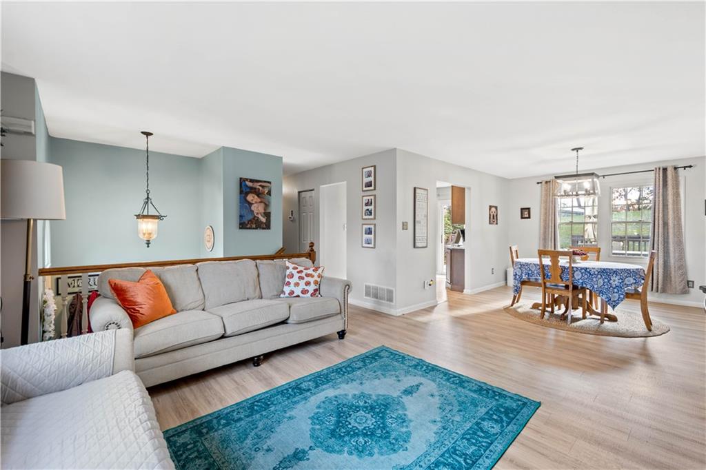307 Lawrence Place Coraopolis, PA 15108 - Photo 9 of 25 a living room with furniture and a table
