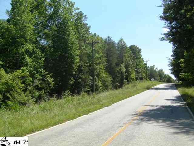 1521 Kilgore Bridge Road Woodruff, SC 29388 - Photo 1 of 1 Before Clearing trees/brush