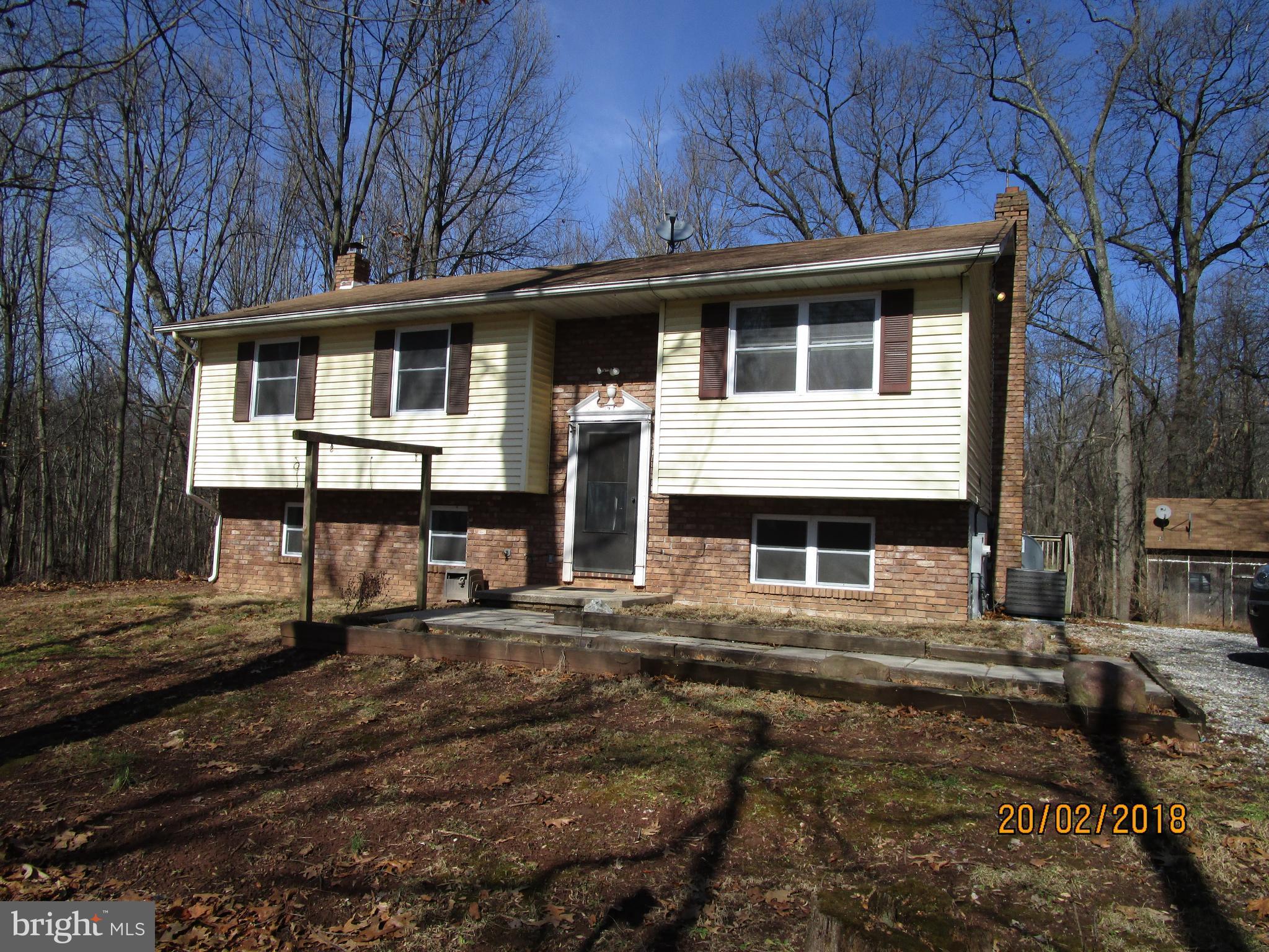 3534 Arters Mill Road Westminster, MD 21158 - Photo 1 of 13 a front view of a house with a yard