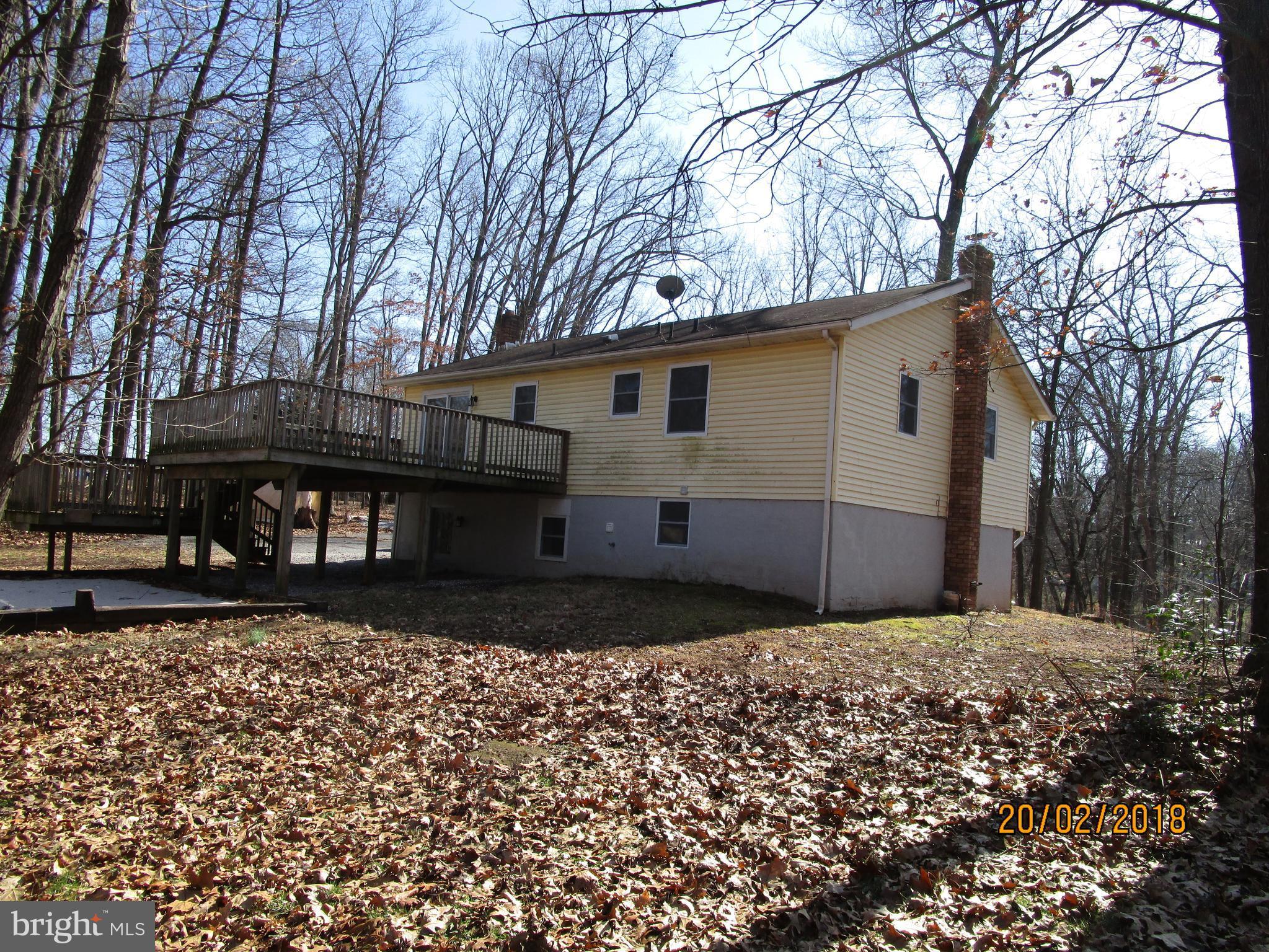 3534 Arters Mill Road Westminster, MD 21158 - Photo 11 of 13 a front view of a house with a yard